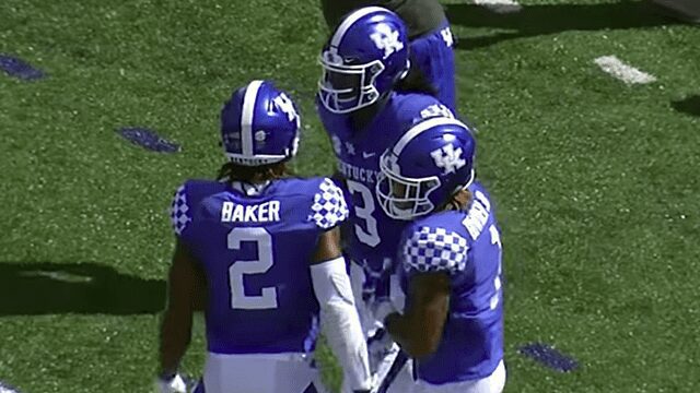 Kentucky football players celebrate score
