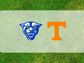 Georgia State and Tennessee logos on grass field