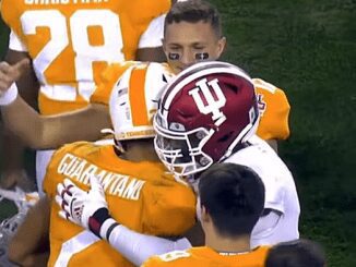 Tennessee player hugs Indiana player